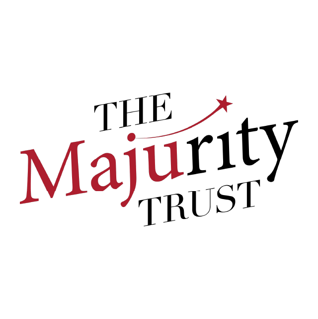 Logo of The Majurity Trust. The words are in red and black text. The dot above the letter j extends into a swoosh that terminates in a star.