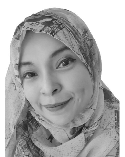 Black and white photo of Ain Hamzah, she is smiling and wearing a flowing patterned hijab
